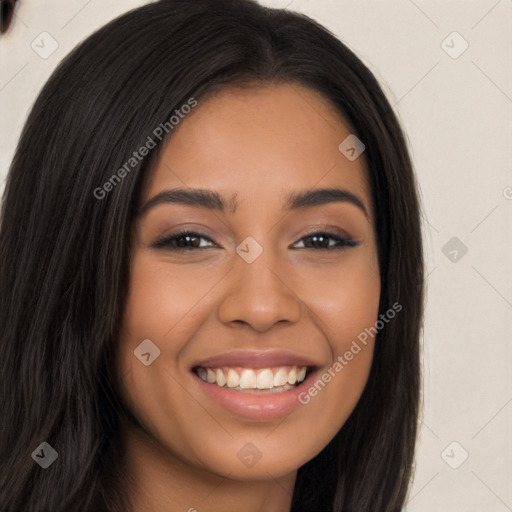 Joyful latino young-adult female with long  brown hair and brown eyes