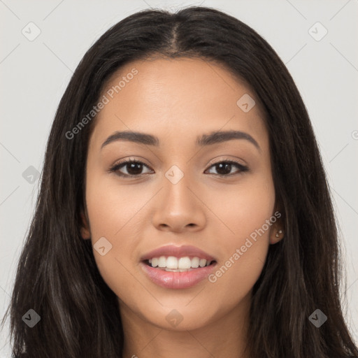 Joyful latino young-adult female with long  black hair and brown eyes