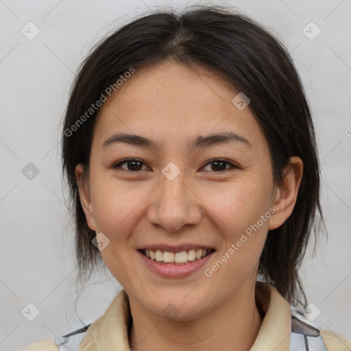 Joyful latino young-adult female with medium  brown hair and brown eyes