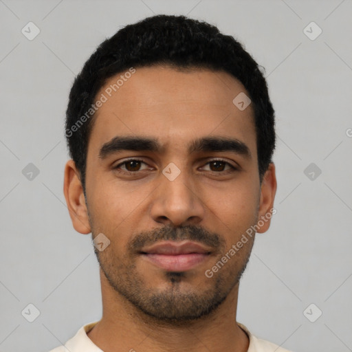 Neutral latino young-adult male with short  black hair and brown eyes