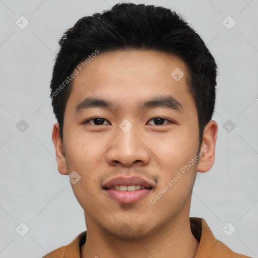 Joyful asian young-adult male with short  black hair and brown eyes