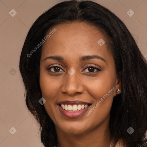 Joyful latino young-adult female with long  brown hair and brown eyes