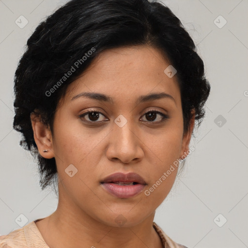 Joyful latino young-adult female with medium  black hair and brown eyes