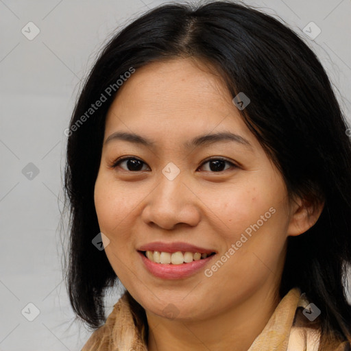 Joyful asian young-adult female with long  brown hair and brown eyes