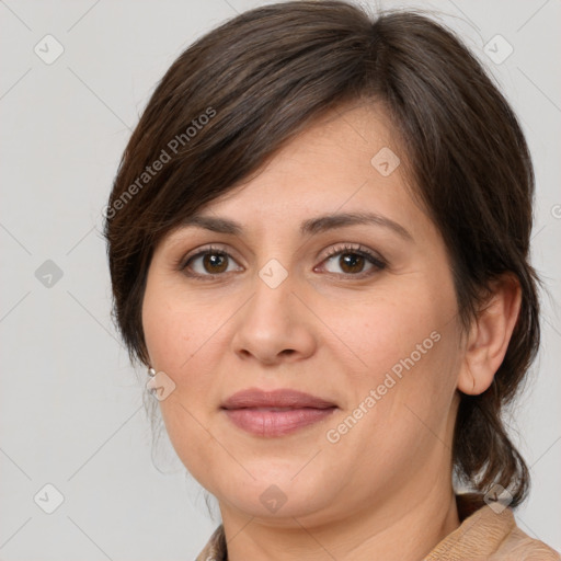 Joyful white adult female with medium  brown hair and brown eyes