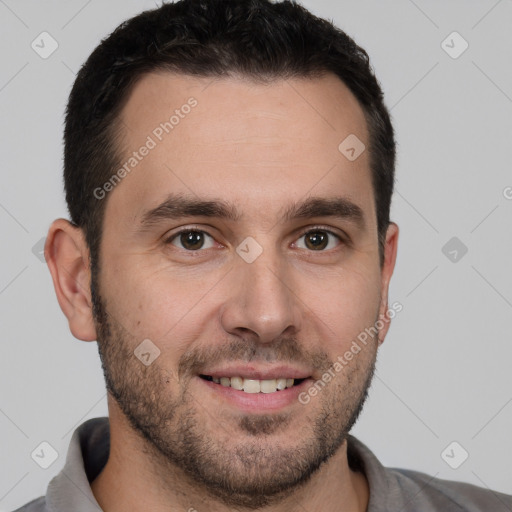 Joyful white young-adult male with short  brown hair and brown eyes