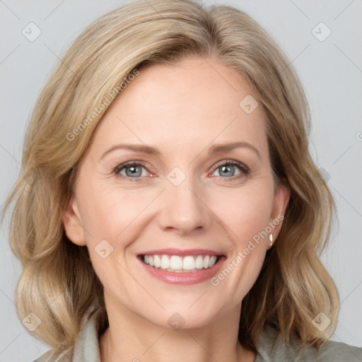 Joyful white young-adult female with medium  brown hair and blue eyes