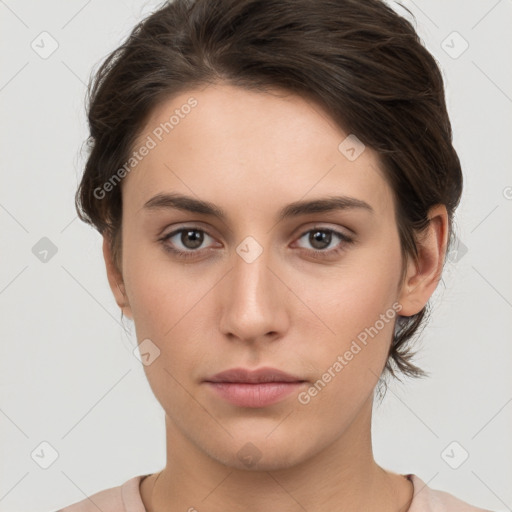 Neutral white young-adult female with short  brown hair and brown eyes