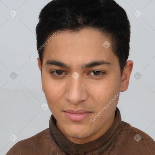 Joyful latino young-adult male with short  brown hair and brown eyes