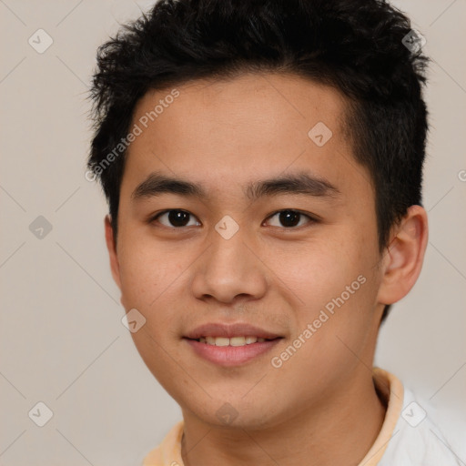 Joyful asian young-adult male with short  brown hair and brown eyes