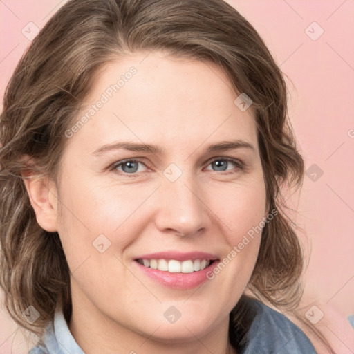 Joyful white young-adult female with medium  brown hair and blue eyes