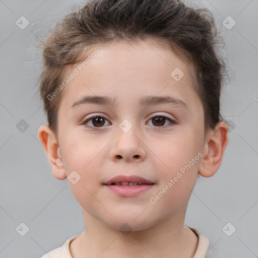 Joyful white child male with short  brown hair and brown eyes