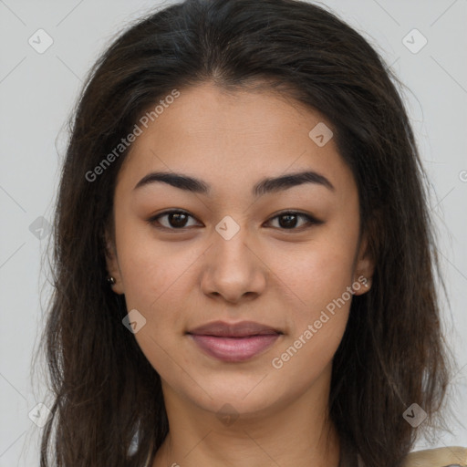 Joyful latino young-adult female with long  brown hair and brown eyes