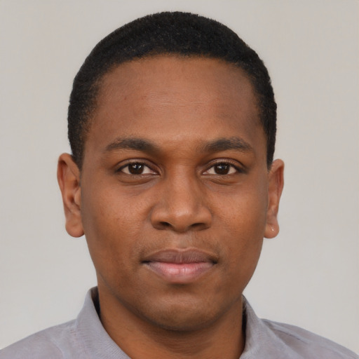 Neutral black young-adult male with short  black hair and brown eyes