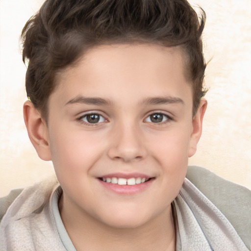 Joyful white child female with short  brown hair and brown eyes