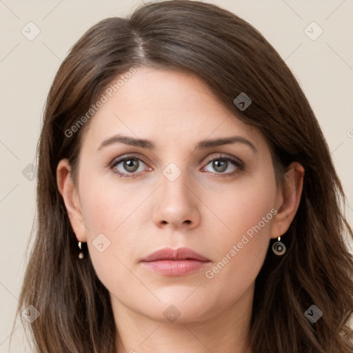 Neutral white young-adult female with long  brown hair and brown eyes