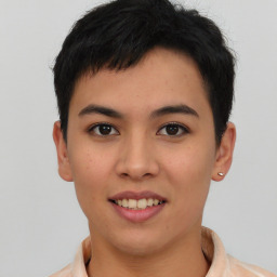 Joyful asian young-adult female with short  black hair and brown eyes