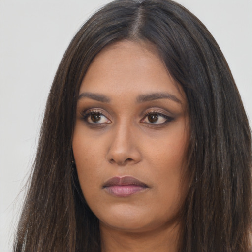 Neutral asian young-adult female with long  brown hair and brown eyes