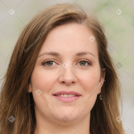 Joyful white young-adult female with long  brown hair and green eyes