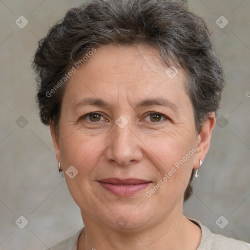 Joyful white adult female with short  brown hair and brown eyes