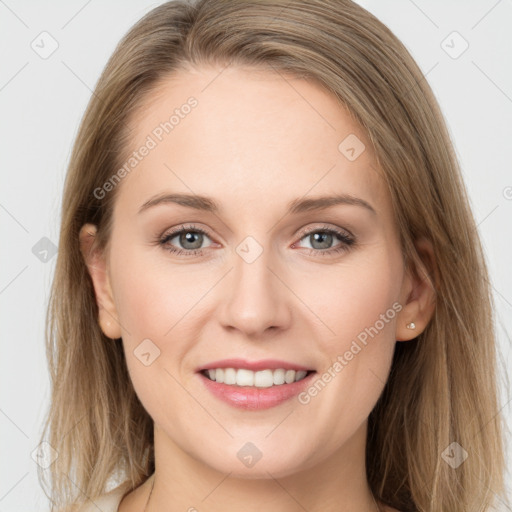 Joyful white young-adult female with long  brown hair and grey eyes