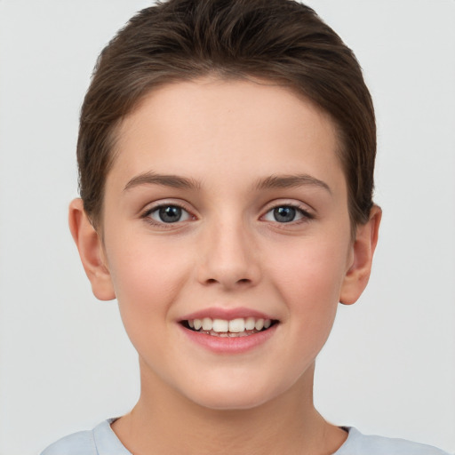 Joyful white child female with short  brown hair and brown eyes