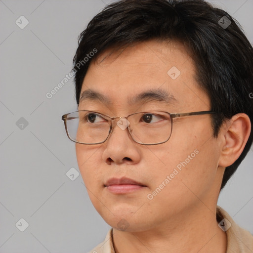 Neutral white young-adult male with short  brown hair and brown eyes