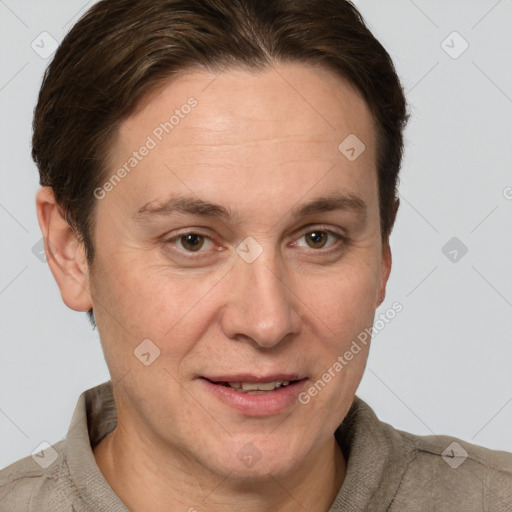 Joyful white adult female with short  brown hair and grey eyes