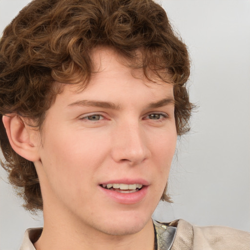 Joyful white young-adult male with medium  brown hair and brown eyes