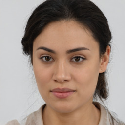 Joyful asian young-adult female with medium  brown hair and brown eyes