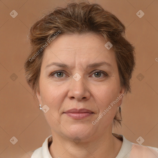 Joyful white adult female with short  brown hair and brown eyes