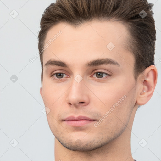 Neutral white young-adult male with short  brown hair and brown eyes