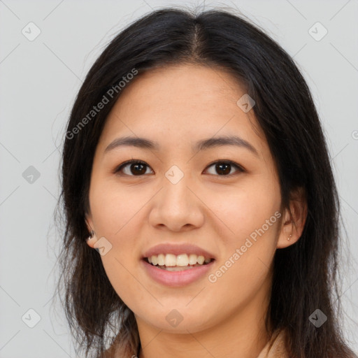 Joyful asian young-adult female with long  brown hair and brown eyes