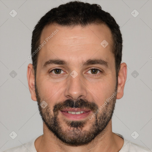 Joyful white adult male with short  brown hair and brown eyes