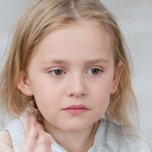 Neutral white child female with medium  brown hair and blue eyes