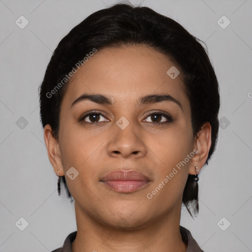 Joyful latino young-adult female with short  black hair and brown eyes