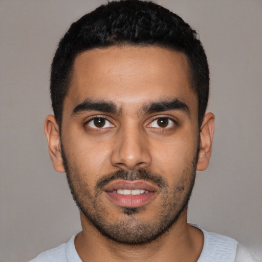 Neutral latino young-adult male with short  black hair and brown eyes
