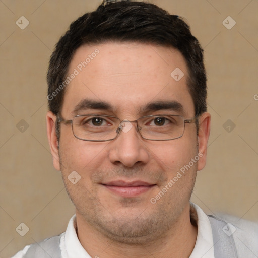 Joyful white adult male with short  black hair and brown eyes