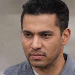 Neutral asian young-adult male with short  black hair and brown eyes