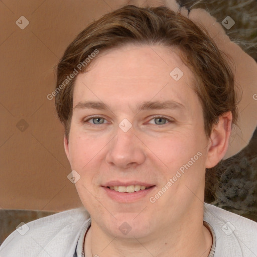 Joyful white adult male with short  brown hair and grey eyes