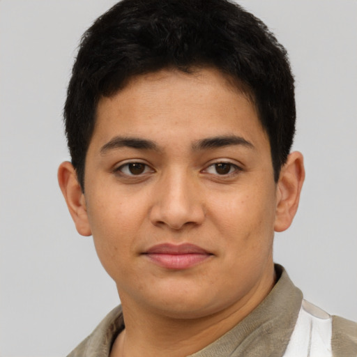 Joyful latino young-adult female with short  brown hair and brown eyes