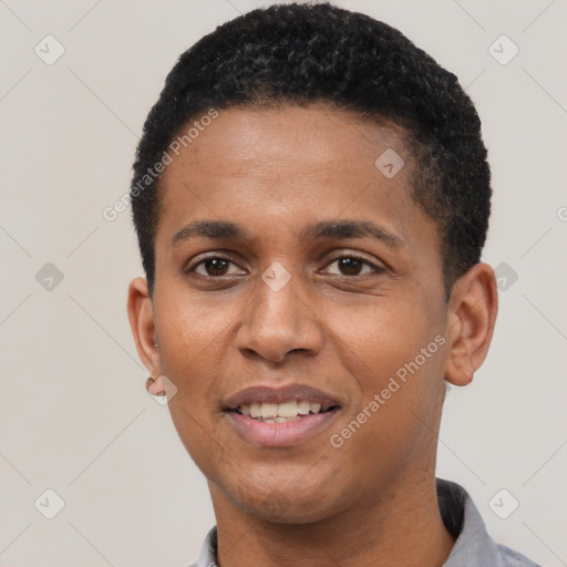 Joyful black adult male with short  black hair and brown eyes