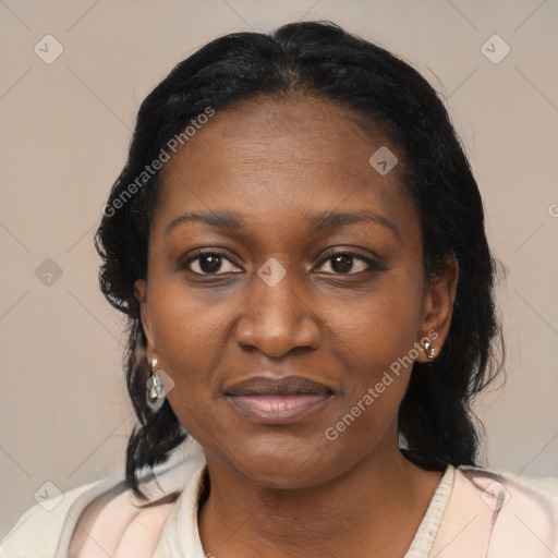 Joyful black adult female with medium  black hair and brown eyes