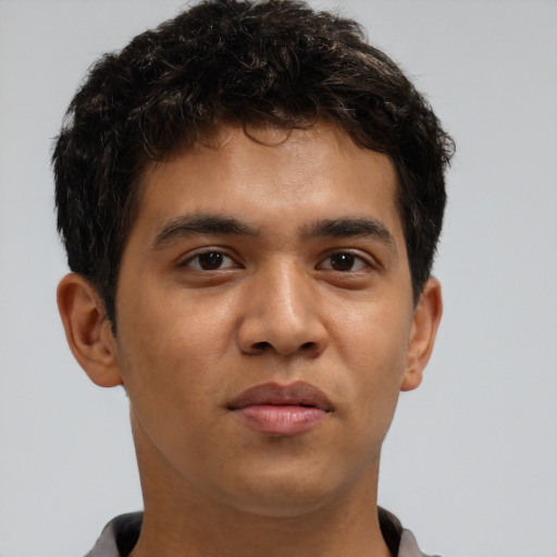 Neutral latino young-adult male with short  brown hair and brown eyes