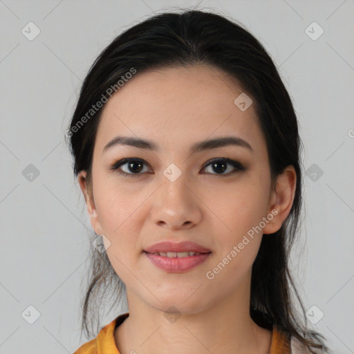 Joyful latino young-adult female with medium  black hair and brown eyes