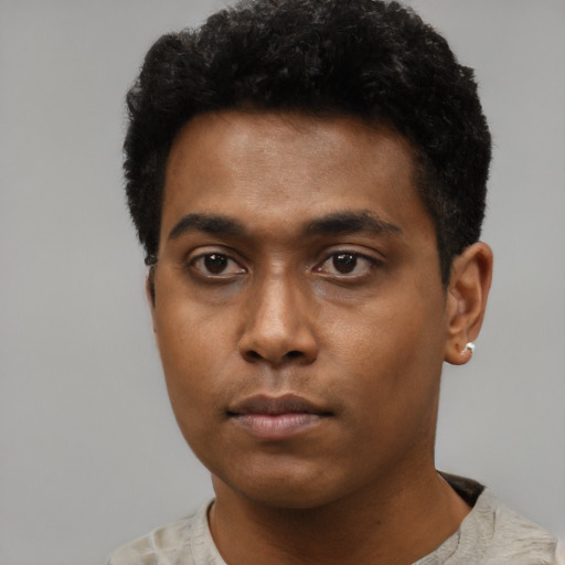Neutral black young-adult male with short  black hair and brown eyes