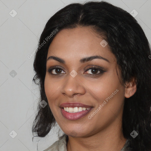 Joyful latino young-adult female with long  black hair and brown eyes