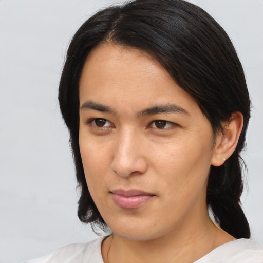 Neutral asian young-adult female with medium  brown hair and brown eyes