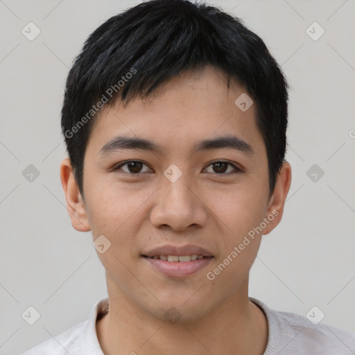 Joyful asian young-adult male with short  black hair and brown eyes