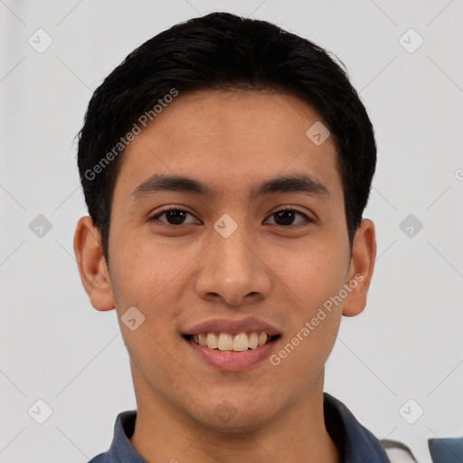 Joyful latino young-adult male with short  brown hair and brown eyes